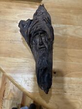 Hand carved  bearded face man on pine knot picture