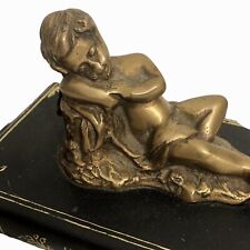 Vintage Brass Paperweight Reclining Sleeping Baby Angel Cupid on Book picture