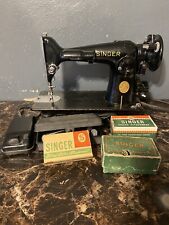 1950’s singer sewing machine with attachments picture