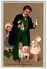 1909 Father Holding Milk Bottle Babies Toddler Embossed Grand Island NE Postcard picture