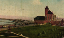 1911 Lake Front Showing Logan Monument And Illinois Central Depot Postcard picture