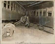1929 Press Photo Officer inspects a railroad wreck at Calverton, Long Island NY picture