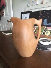 Old Handcrafted Wooden Pitcher picture