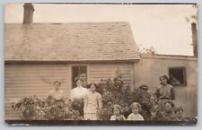 Postcard Portrait of Family in Front of House, Vintage RPPC picture