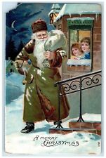 c1910's Christmas Green Robe Santa Claus Sack Of Toys Winter Embossed Postcard picture