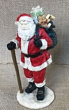 Santa Claus With Walking Stick Carrying Full Sack Figurine Christmas Holiday picture