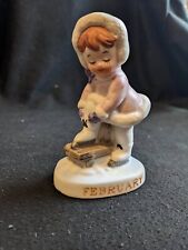 Vintage  1960's little girl putting on ice skates February 1 owner Made in Japan picture