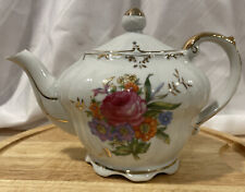 Vintage Musical Teapot with Flowers and Gold Trim picture