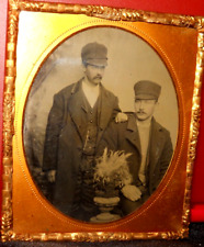1/6th Size Tintype of two men in caps in brass mat/frame picture