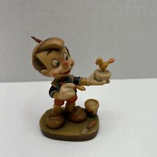 Anri Disney Woodcarvings:  Pinocchio With Bird Made In Italy picture