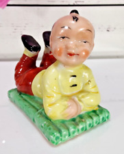 Vintage Occupied Japan Figurine Man on a Bamboo Yoga Mat 3 Inches Wide picture
