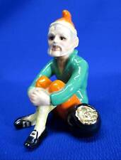 HANDSOME LEPRECHAUN MADE IN IRELAND SITTING NEXT TO HIS POT OF GOLD FIGURINE picture