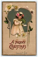 c1910's Christmas Pretty Girl Holding Mistletoe Flowers Embossed Postcard picture