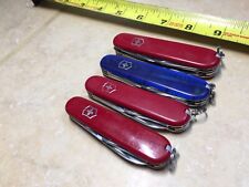 Lot Of 4 Victorinox Swiss Army Knives- 1 Tinker Sapphire , 1 Camper, 2 Recruit picture