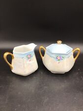 Antique German Porcelain Creamer and Sugar with Lid Iridescent Blue Pink Flowers picture