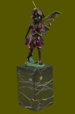 Fairy Standing with a flower Garden Statue in aged bronze finish. 13