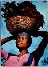 VINTAGE CONTINENTAL SIZED POSTCARD YOUNG JAITIAN GIRL CARRYING ON HER HEAD 1975 picture