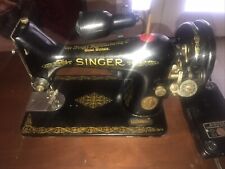 The Singer Manufacturing CoVintage Singer Sewing Machine With Light And Cabinet picture
