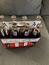 Pepsi Full Bottles 8 pack with box Richard Petty Set of 8 Full Long NeckBottles. picture