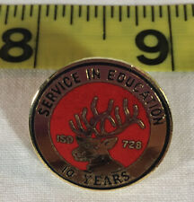 Service in Education 10 Years Stag Buck Pin ISO 728 Red Gold Tone Jostens picture