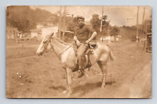 RPPC Big Man Small Horse Unknwon Town View Real Photo Postcard picture