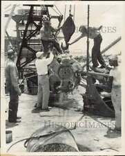 1955 Press Photo Workmen cutting head of a dredge in Fort Lauderdale - lrb02991 picture