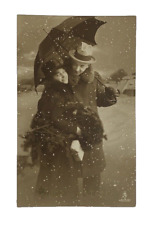 RPPC Buon Natale Merry Christmas Italian Couple Snow Falling Real Photo Postcard picture