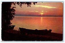 Greetings From Paw Paw MI, Sunrise On One Of Michigan's Lakes Vintage Postcard picture