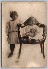 RPPC Postcard Little Girl Baby in a Chair with Teddy Bear Studio Portrait picture