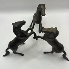 Three Brass Horses In Circle Rearing Statue picture