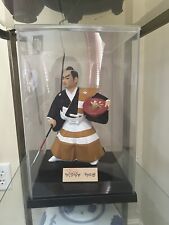 Vintage Japanese Hakata Doll, Samurai Figurine with wood stand and plastic case picture