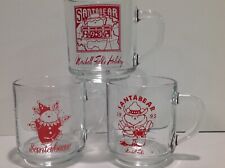 3 Marshall Field’s Christmas Holiday Santa Bear Glass Mugs 1993 1994 1995 picture