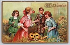Halloween Tucks 183 Children Around Hanging Apple Embossed Rare Antique Postcard picture