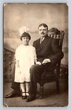 c1923 RPPC Father Sits in Chair with 10 year old Daughter VINTAGE Postcard 1293 picture
