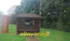 Photo 6x4 Shelter and Telephone box on a very wet day in Ellen's Green  c2010 picture