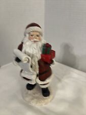 Burton Santa with list and present 7 inches tall picture