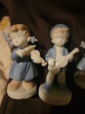 Blue And White Porcelain Girl And Boy With Instruments picture