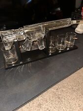 Gun Mount And Whiskey Glasses picture