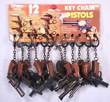 One Dozen ~ Toy Keychain Cap Guns on Full Dime Store Display ~ 1970's Hong Kong picture