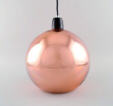 Tom Dixon,  British designer. Round copper-colored ceiling pendant. picture