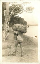 postcard RPPC Philippines Native man reed bundle 23-1638 picture