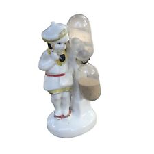 Antique Porcelain Figural Boy on Phone with Egg Timer picture