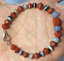 A BRACELET OF ANCIENT FACETED JASPER, BLUE CHALCEDONY, SULEIMANI AGATE BEADS picture