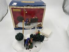 LEMAX 2007 - SNEAK-A-PEEK - Lighted & Animated Village Table Accent (WORKS) picture