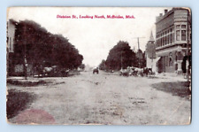1915. MCBRIDES, MICH. DIVISION ST. LOOKING NORTH. POSTCARD SZ23 picture