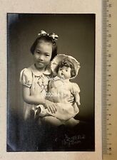 1953 Overseas Chinese children girl with her toy doll studio photo picture
