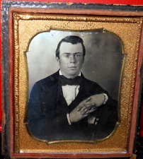 1/6th size Daguerreotype of young man in half case picture