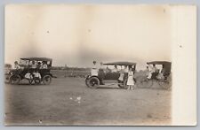 RPPC Men, Women and Children Standing By Cars Waving c1920 Real Photo Postcard picture