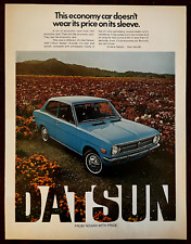1972 NISSAN Datsun Vintage Print Ad 1200 Blue Car Field Flowers Meadow picture