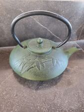 Cast iron teapot with infuser picture